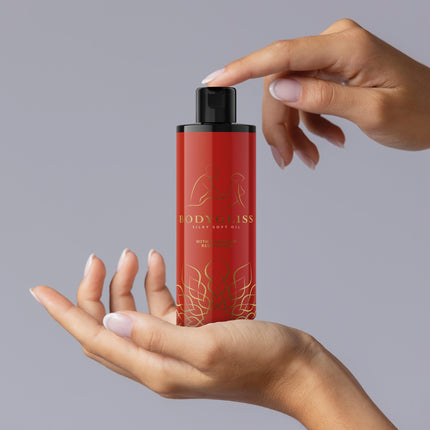 BodyGliss - 2-in-1 masāžas eļļa un uz silikona bāzes veidots lubrikants - 150 ml (Asinsapelsīns)