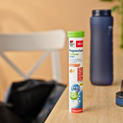 Doppelherz Magnijs + Kālijs SPORT - Magnijs un kālijs veicina normālu muskuļu darbību - vegāns - 15 putojošās tabletes ar citrona-greipfrūtu garšu