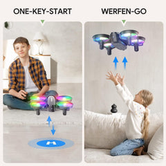 Mini drons ar kameru HD 1080P bērniem iesācējiem, TOMZON RC kvadrokopters ar krāsainām gaismas diodēm, ilgs lidojuma laiks, 360° propelleru aizsardzība/metiens/3D apgrieziens/, helikoptera tālvadības rotaļu drons iekštelpām