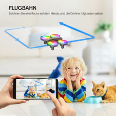 Mini drons ar kameru HD 1080P bērniem iesācējiem, TOMZON RC kvadrokopters ar krāsainām gaismas diodēm, ilgs lidojuma laiks, 360° propelleru aizsardzība/metiens/3D apgrieziens/, helikoptera tālvadības rotaļu drons iekštelpām