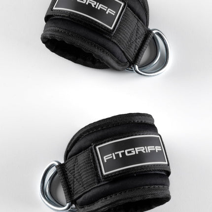 Fitgriff® pēdu siksnas V3 — fitnesa treniņiem uz trošu skriemeļiem — (2 gab.) Potīšu siksnas sievietēm un vīriešiem (melnas)