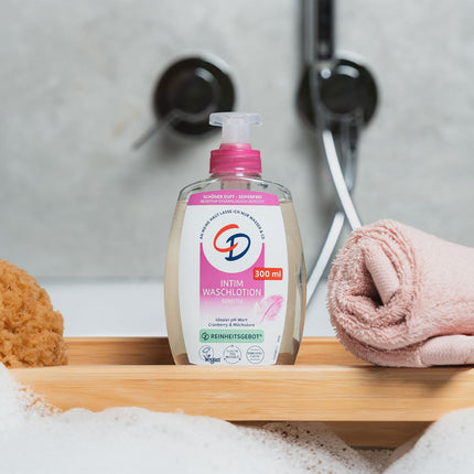 CD Wohlfühl Intim Wash Lotion, 300 ml, losjons intīmās zonas maigai attīrīšanai, ar dzērveņu ekstraktu un pienskābi, ķermeņa kopšana bez ziepēm, smalks aromāts, vegāns